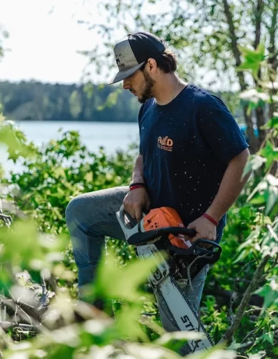 A&D crew chainsaw lakeside brush clearing cayce