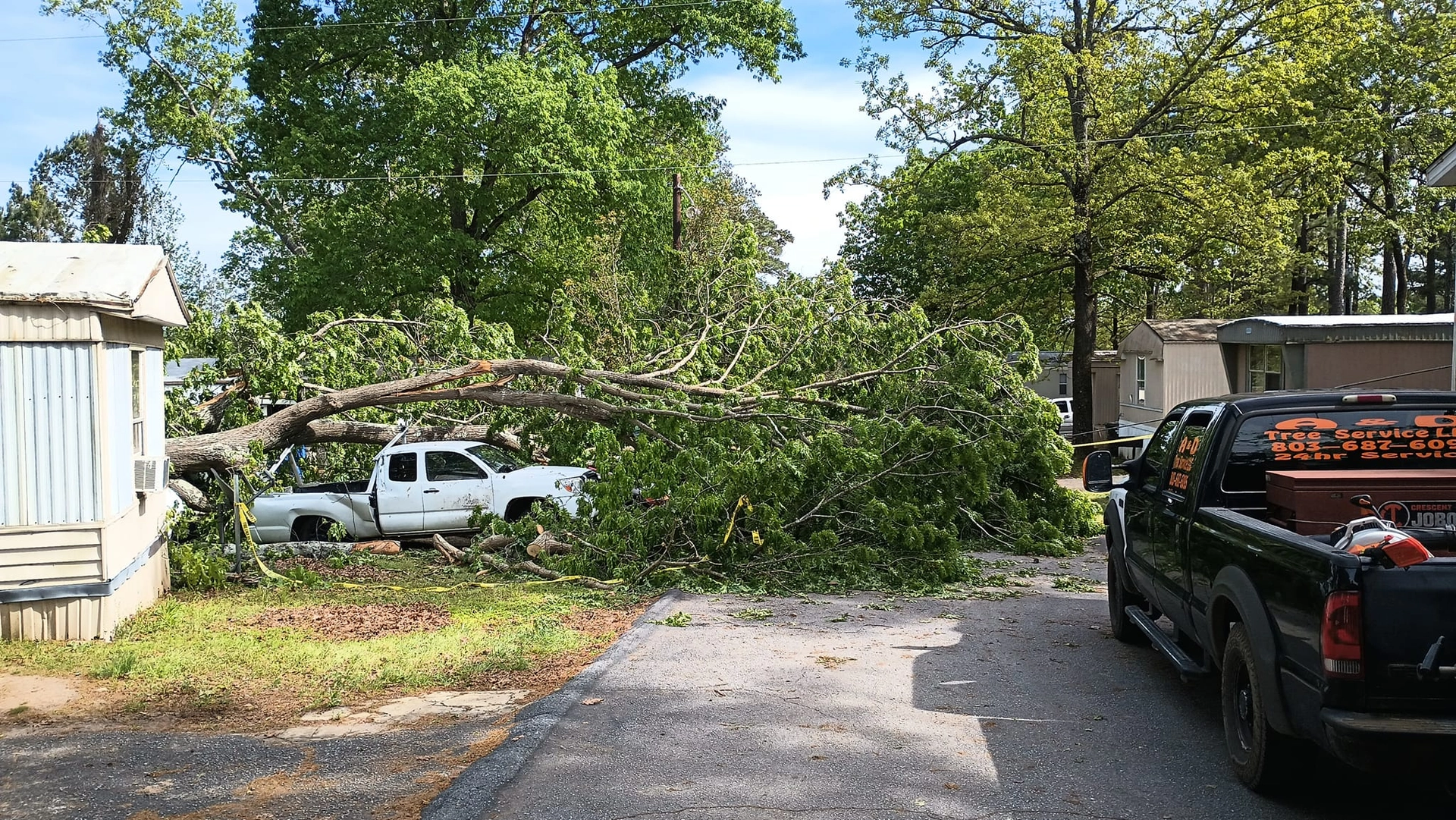 A&D lettered pickup fallen oak crushed white truck mobil