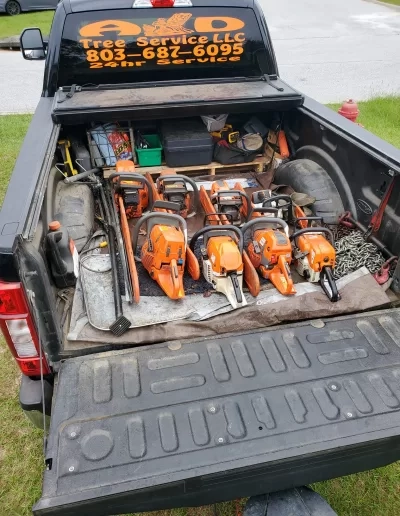 A&D lettered truck bed seven stihl chainsaws tailgate ca