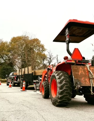A&D marked kubota tractor rear street cones cayce