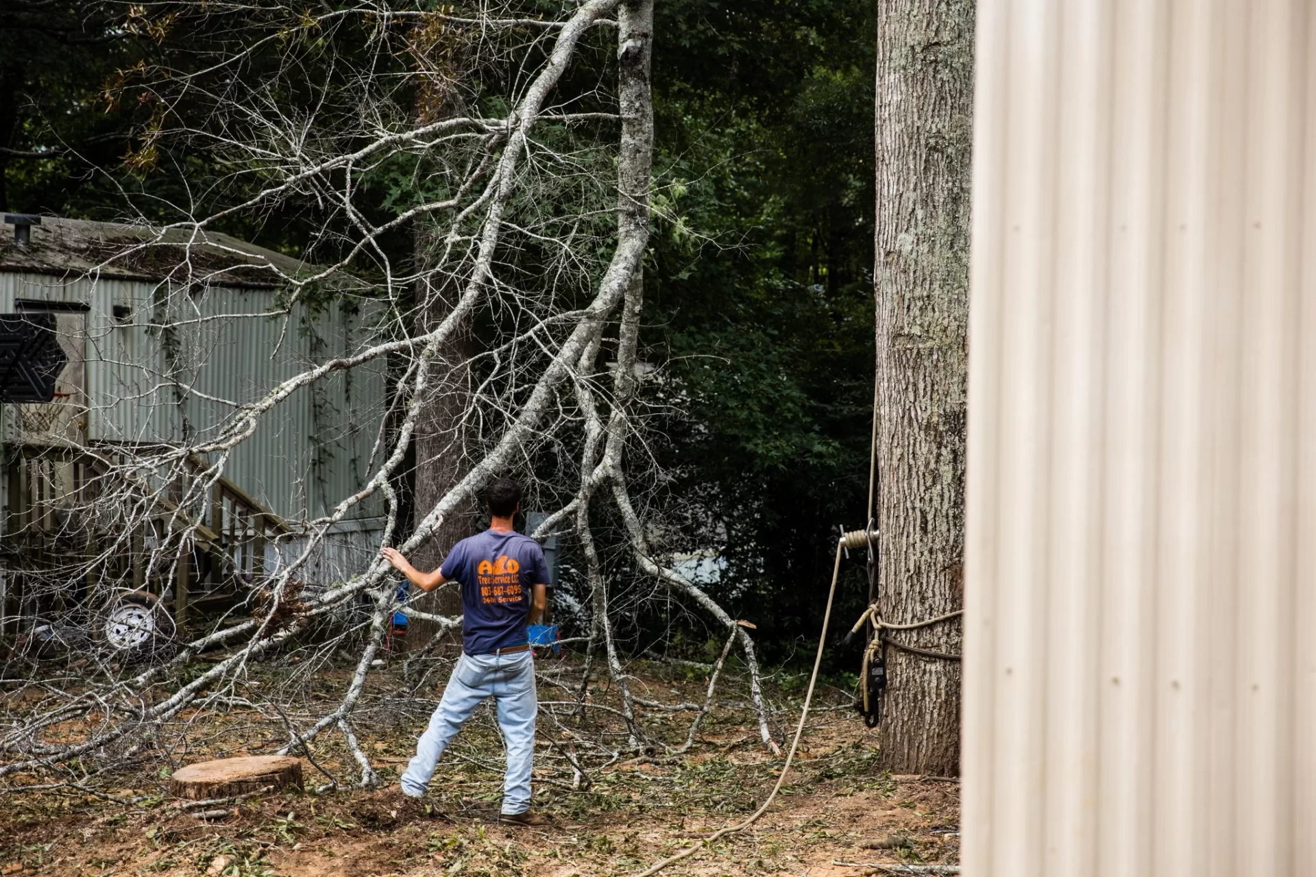 A&D navy tee worker dead limbs roped trunk mobile home c