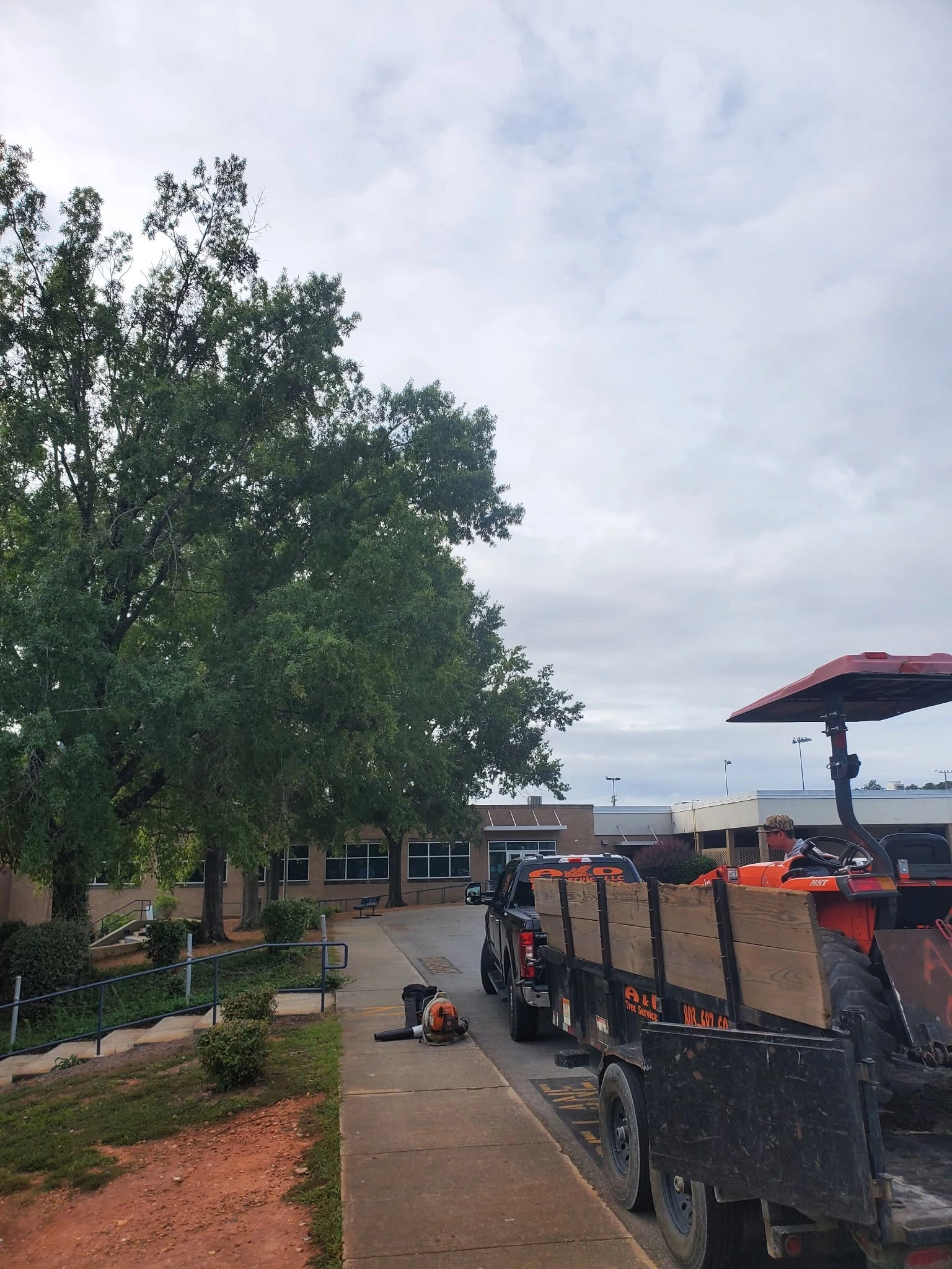 A&D trailer kubota school sidewalk blue handrail cayce