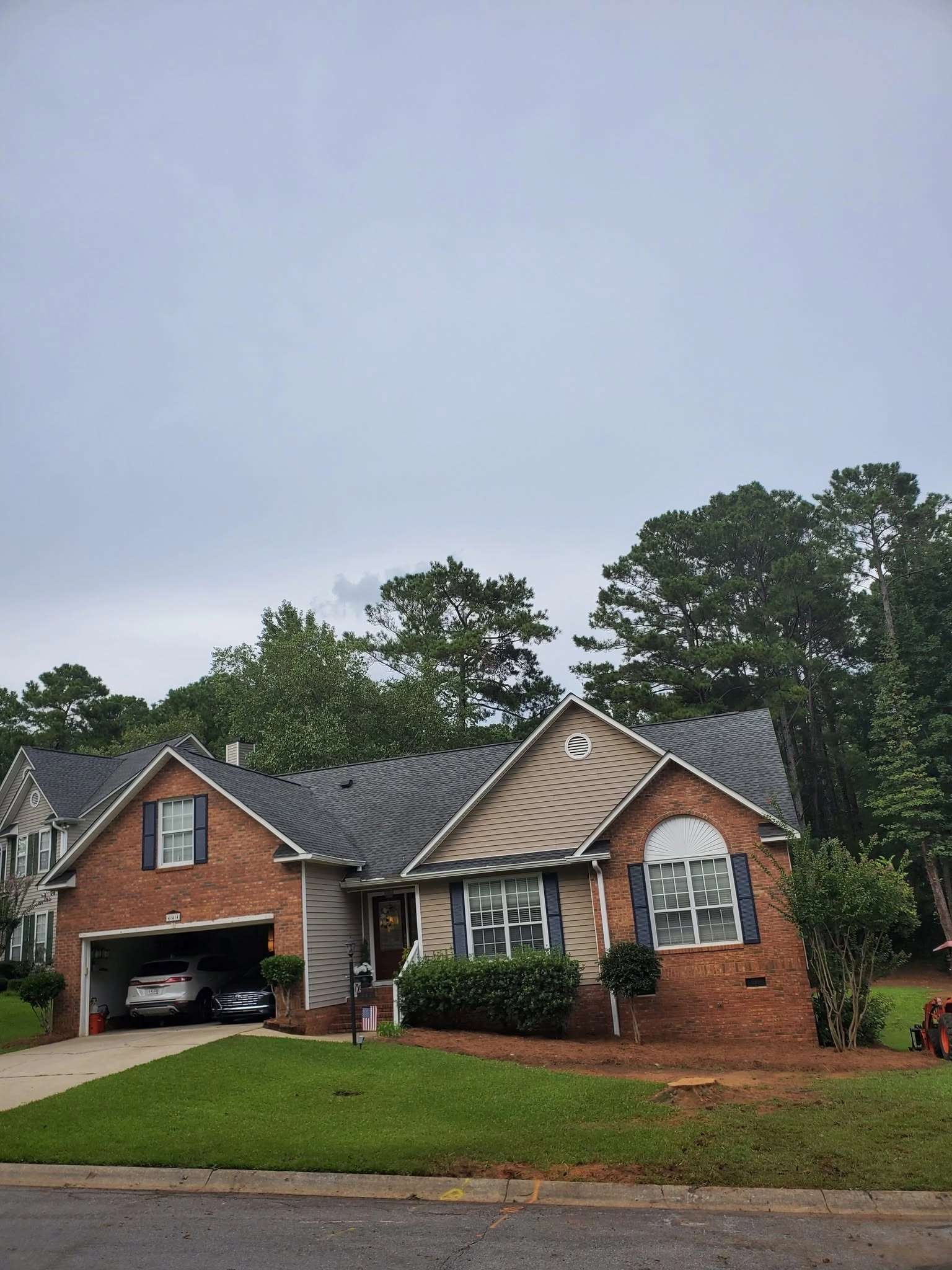 Brick ranch open garage front lawn low stump springdale sc