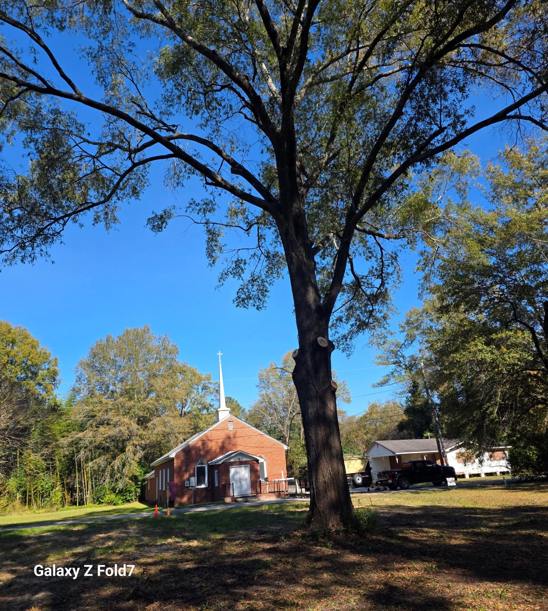 Crown raised oak brick church white steeple lawn cayce sc