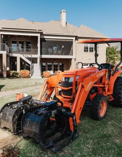 Kubota tractor grapple attachment brick home lawn lexington 