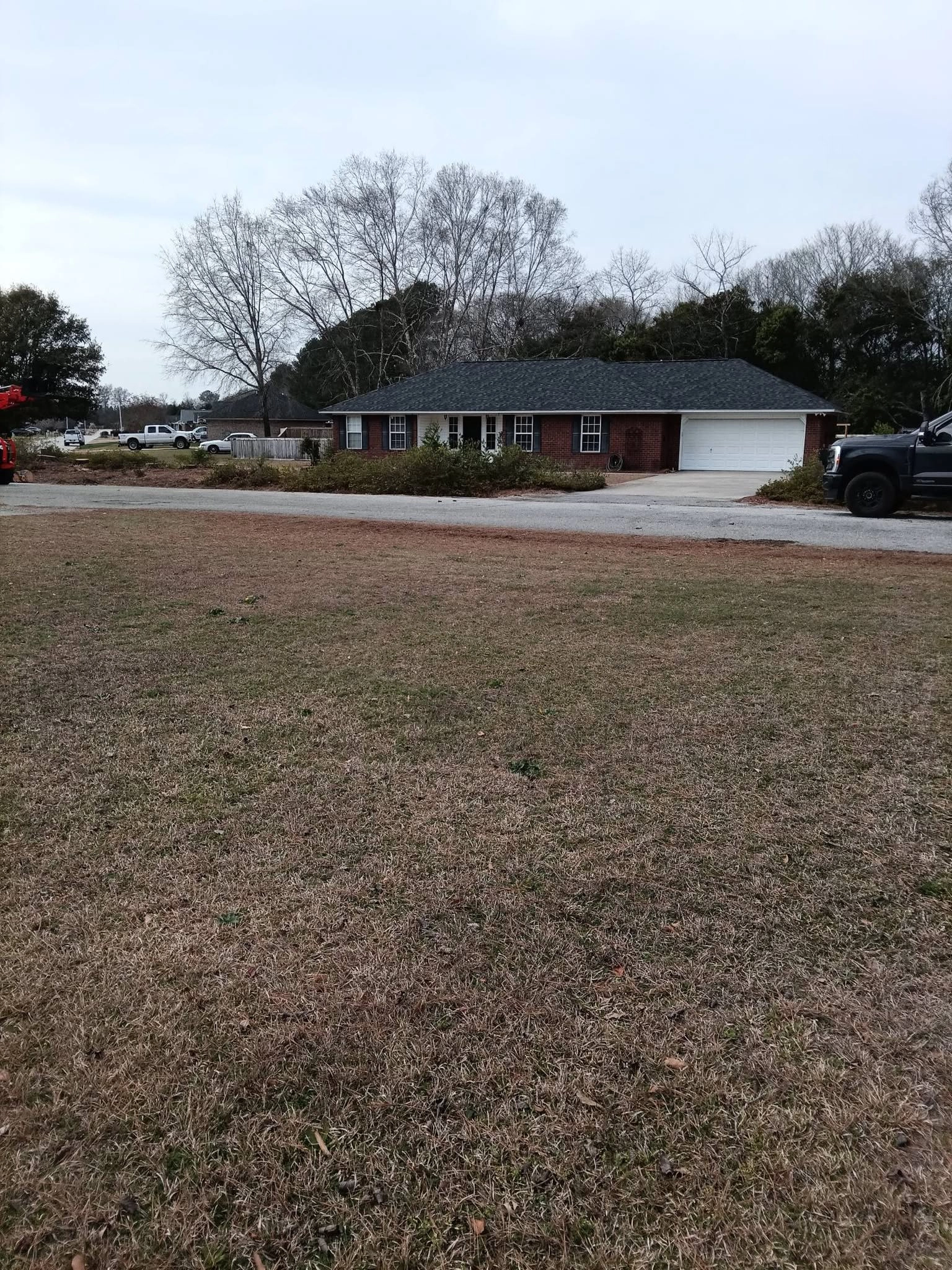 Wide view brick ranch roadside brush piles cayce sc